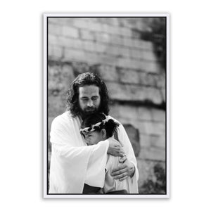Jesus Christ 'Shelter' embrace. Modern black and white Christian art work on metal with white frame by Reflections of Christ.